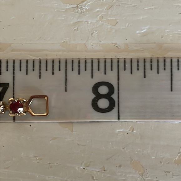 7.5” gold plated tennis bracelet with 38 prong set red and clear crystals - Picture 14 of 15